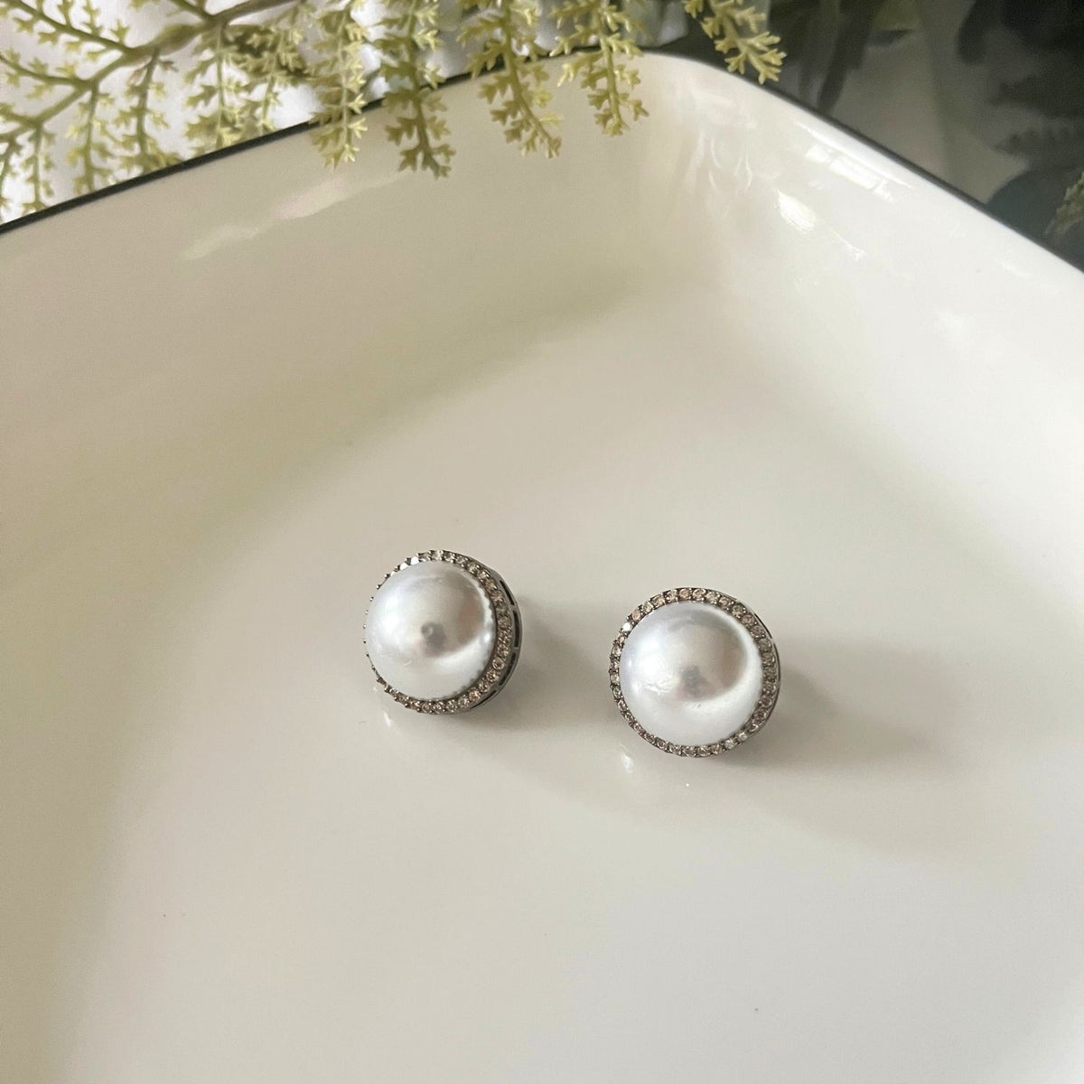 Pearl Studs with Champagne Zirconia Detailing