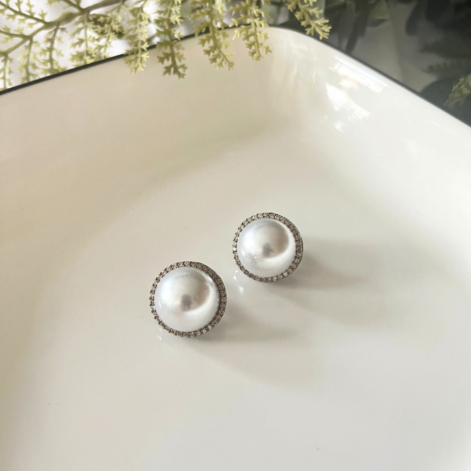 Pearl Studs with Champagne Zirconia Detailing