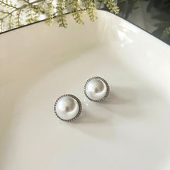 Pearl Studs with Champagne Zirconia Detailing